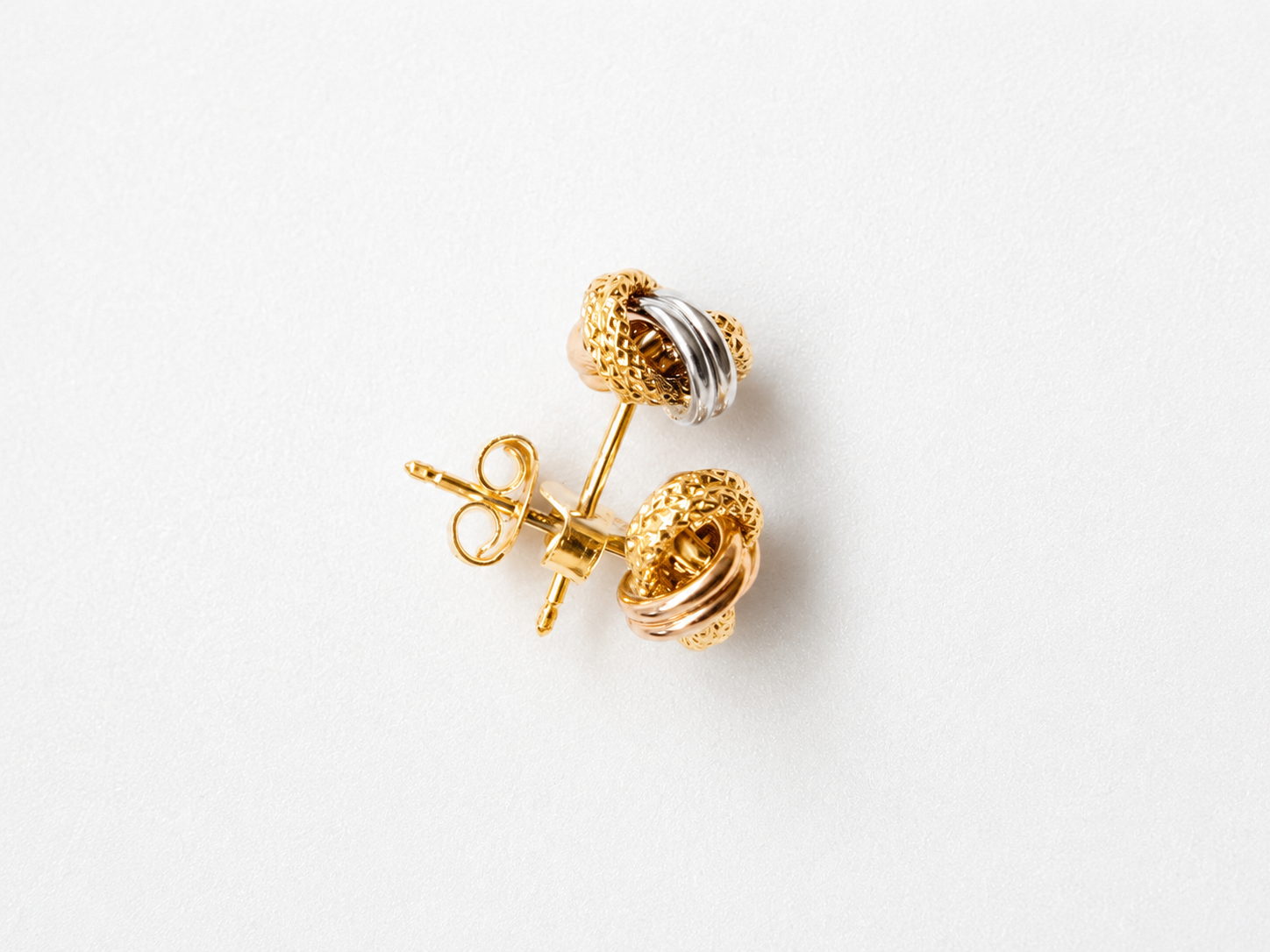 18K solid gold tri-tone knot stud earrings