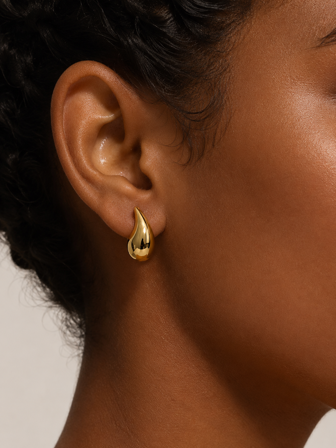 18K solid gold teardrop huggie earrings