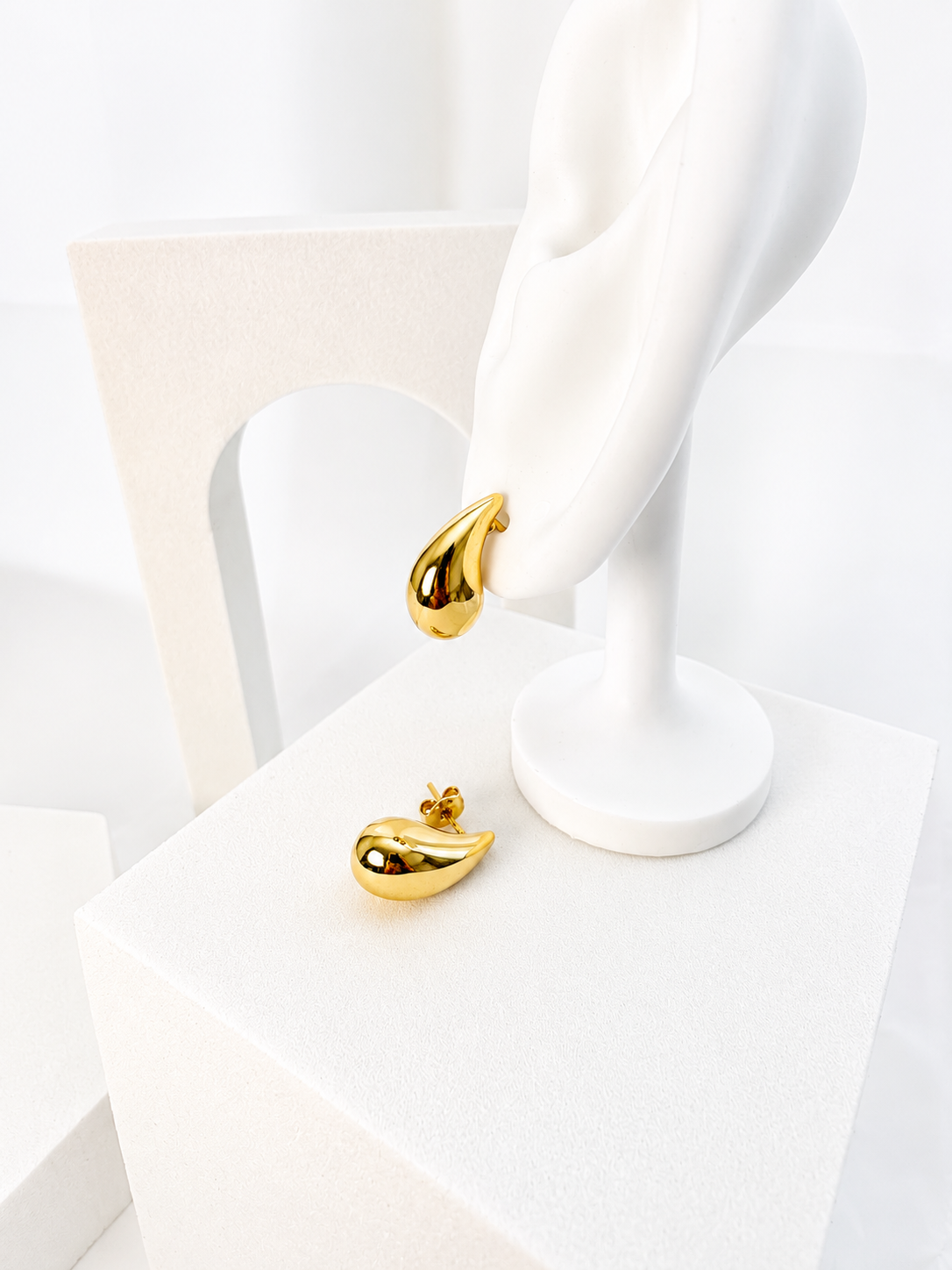 18K solid gold teardrop huggie earrings