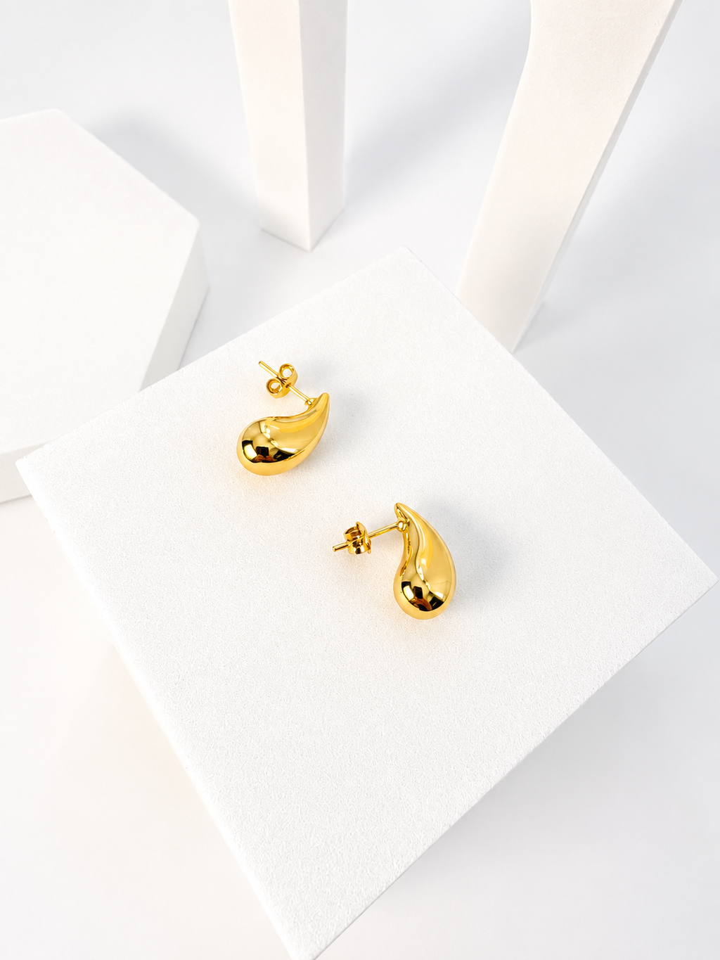 18K solid gold teardrop huggie earrings